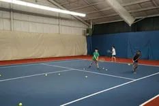 Kids playing tennis at Fore Court
